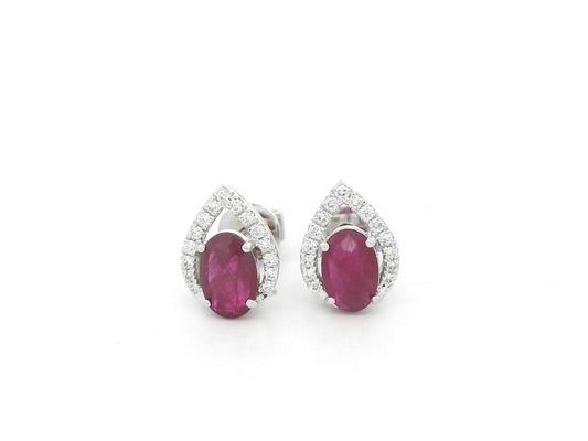 18K white gold ruby and diamond stud earrings featuring oval-cut rubies with diamond accents by Emirates Diamonds.