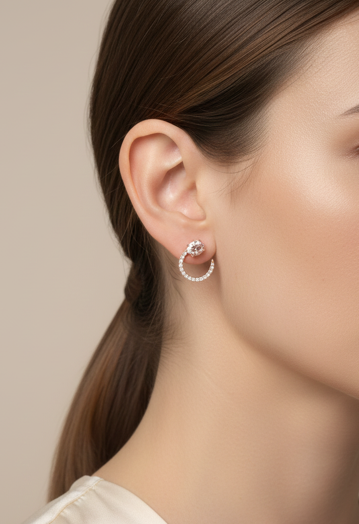 18K rose gold earrings featuring oval-cut morganite gemstones with diamond crescent detailing by Emirates Diamonds.