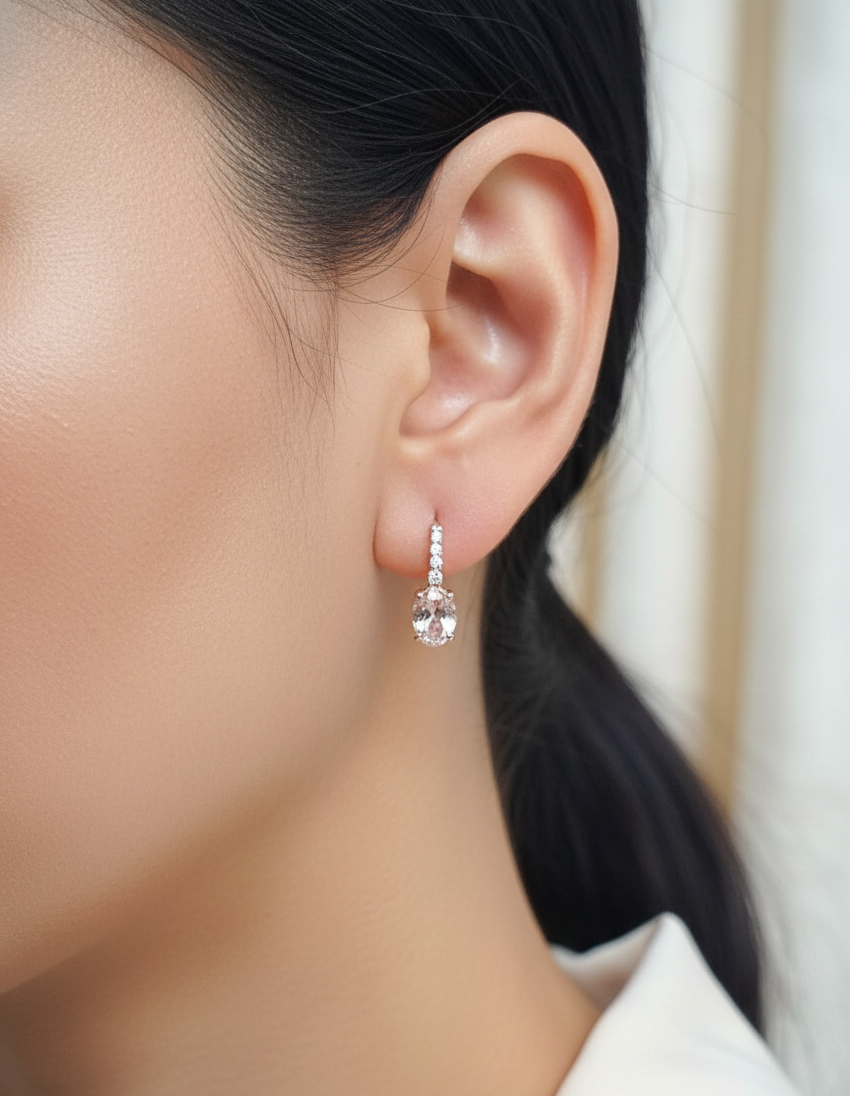 18K rose gold lever-back earrings featuring oval morganite gemstones with diamond accents – Emirates Diamonds