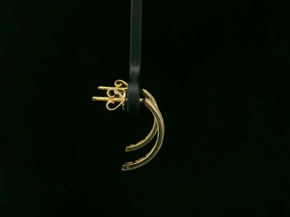 Diamond half hoop earrings with 0.31ct round diamonds set in 18K yellow gold by Emirates Diamonds