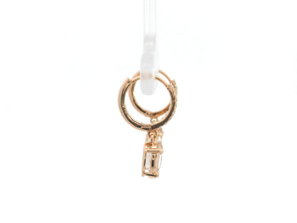 18K rose gold drop earrings featuring oval-cut morganite gemstones with diamond-accented hoops by Emirates Diamonds.