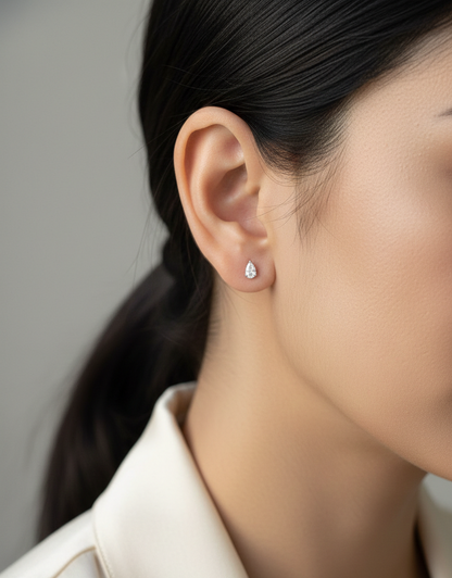 18K white gold pear cut diamond solitaire stud earrings with 0.37 carat diamonds by Emirates Diamonds