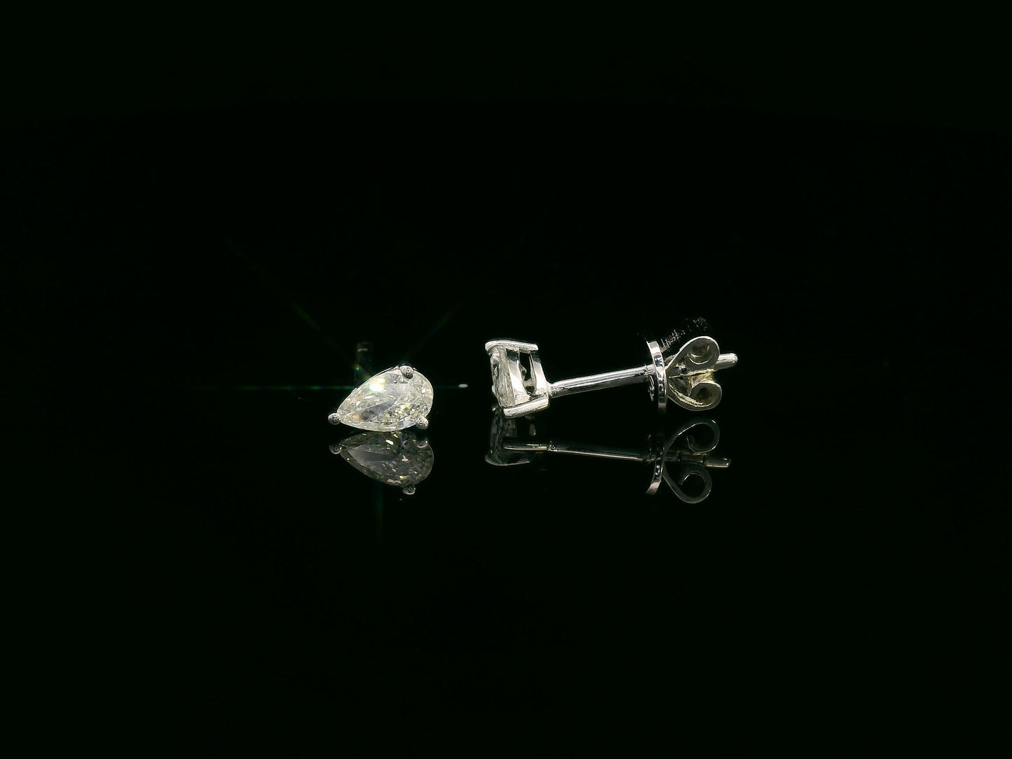 18K white gold pear cut diamond solitaire stud earrings with 0.37 carat diamonds by Emirates Diamonds