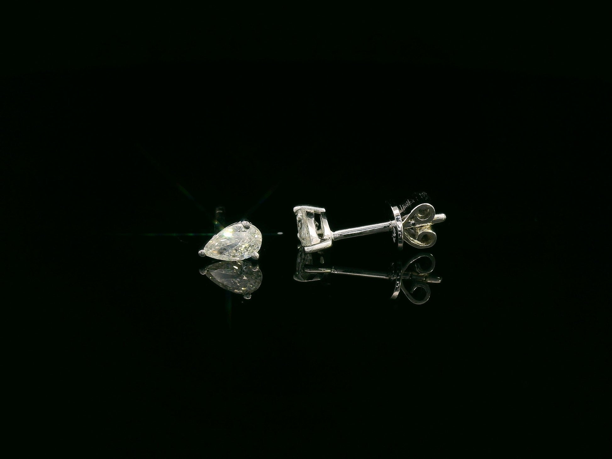 18K white gold pear cut diamond solitaire stud earrings with 0.37 carat diamonds by Emirates Diamonds