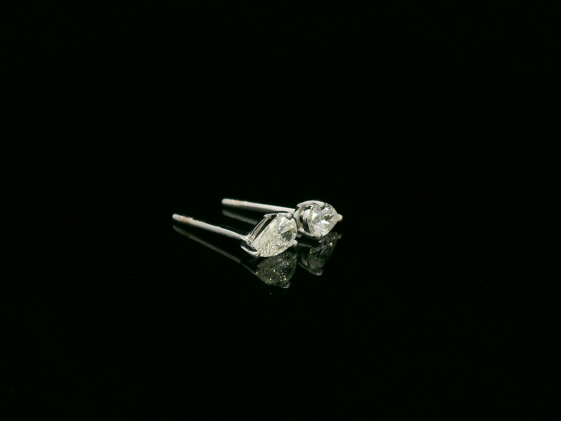 18K white gold pear cut diamond solitaire stud earrings with 0.37 carat diamonds by Emirates Diamonds