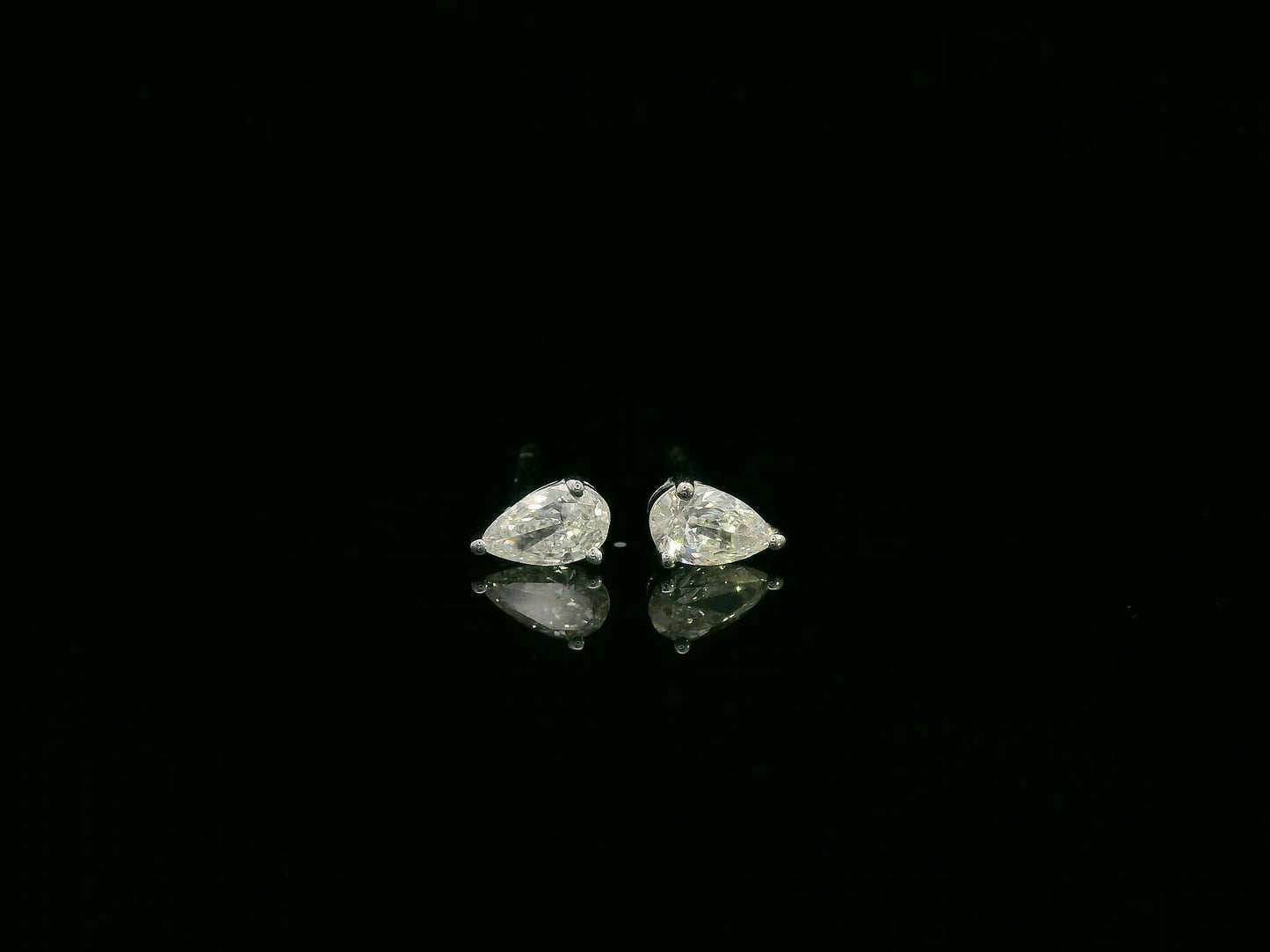 18K white gold pear cut diamond solitaire stud earrings with 0.37 carat diamonds by Emirates Diamonds