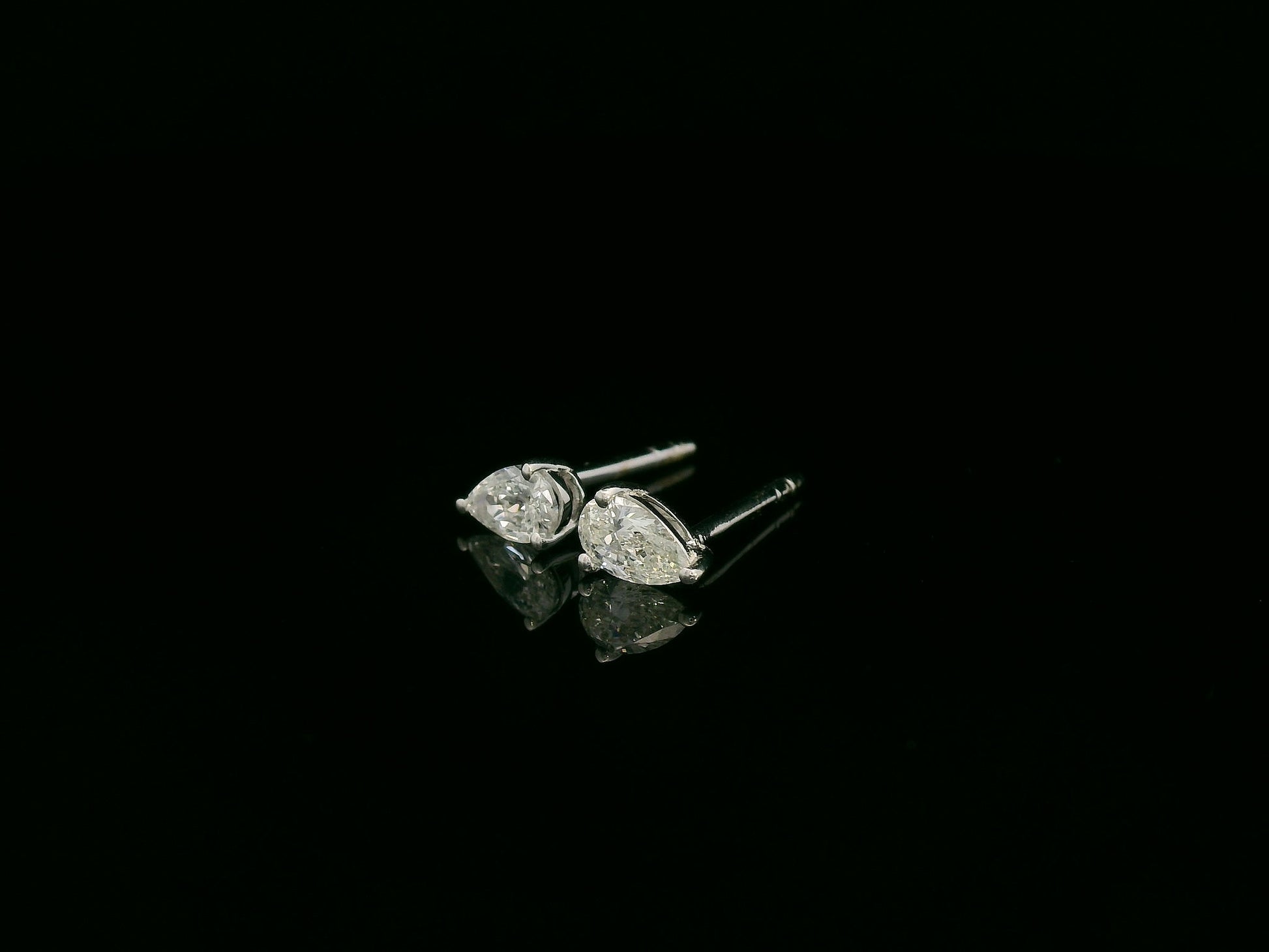 18K white gold pear cut diamond solitaire stud earrings with 0.37 carat diamonds by Emirates Diamonds