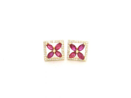 18K yellow gold square stud earrings with ruby cluster center and diamond halo by Emirates Diamonds.