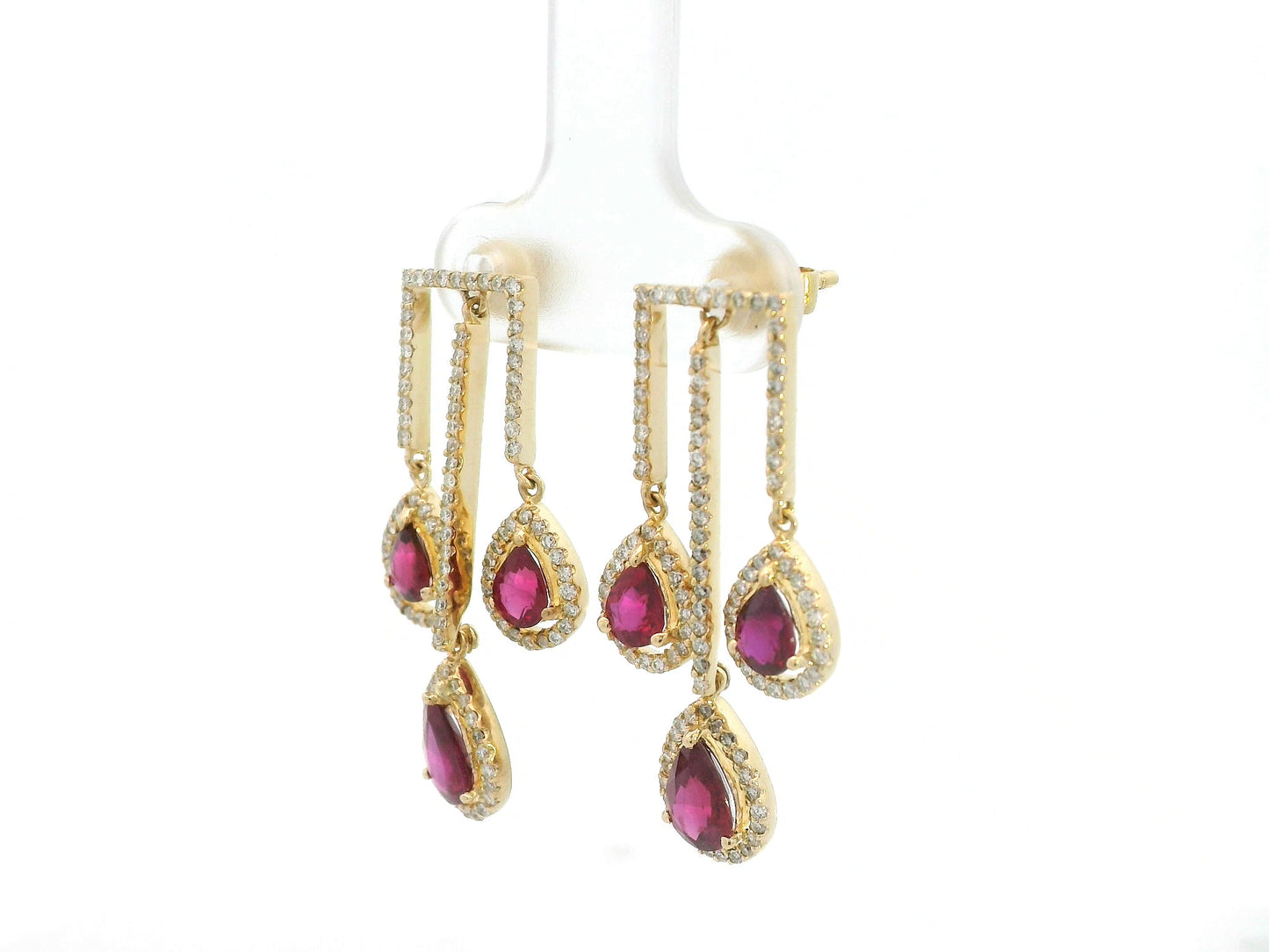 2.65 carat pear ruby and 0.91 carat diamond halo drop earrings in 18K yellow gold by Emirates Diamonds