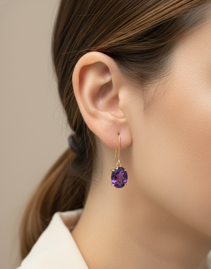 18K yellow gold amethyst drop earrings with oval-cut amethysts by Emirates Diamonds
