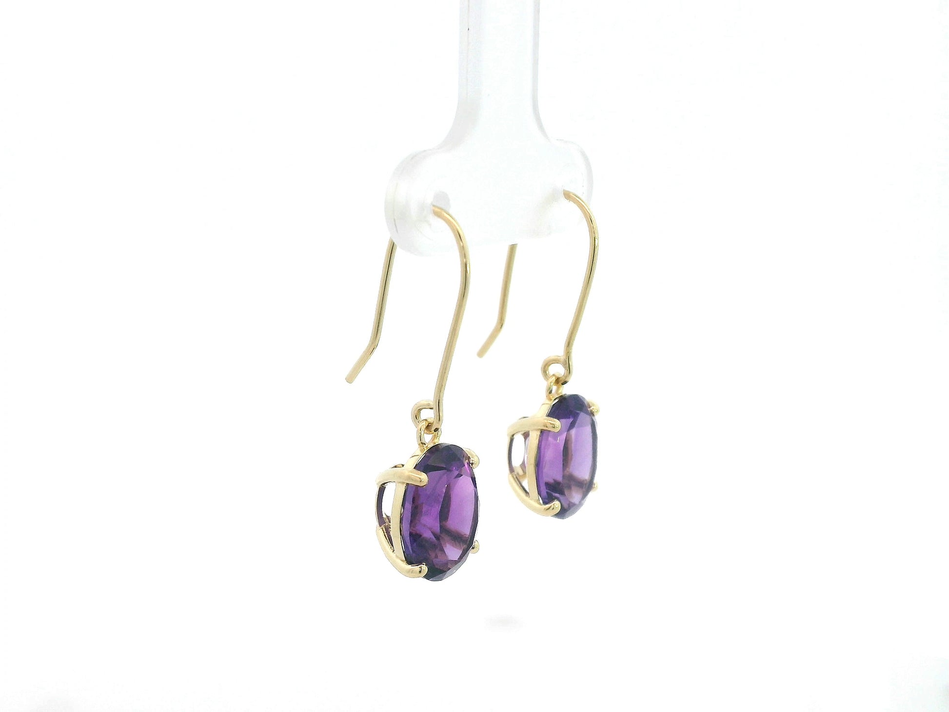 18K yellow gold amethyst drop earrings with oval-cut amethysts by Emirates Diamonds