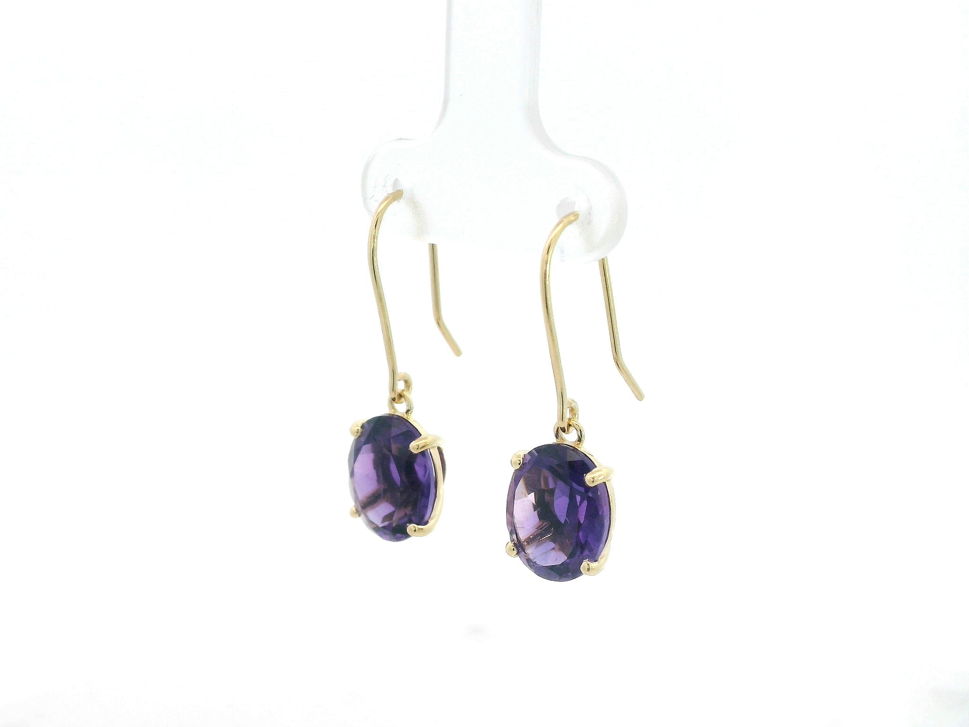 18K yellow gold amethyst drop earrings with oval-cut amethysts by Emirates Diamonds