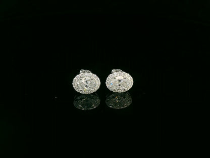 18K white gold oval cut diamond halo stud earrings with 1.40 carat GIA certified diamonds by Emirates Diamonds