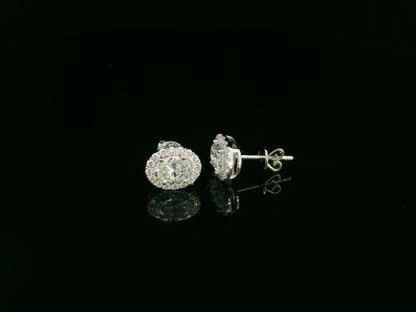 18K white gold oval cut diamond halo stud earrings with 1.40 carat GIA certified diamonds by Emirates Diamonds