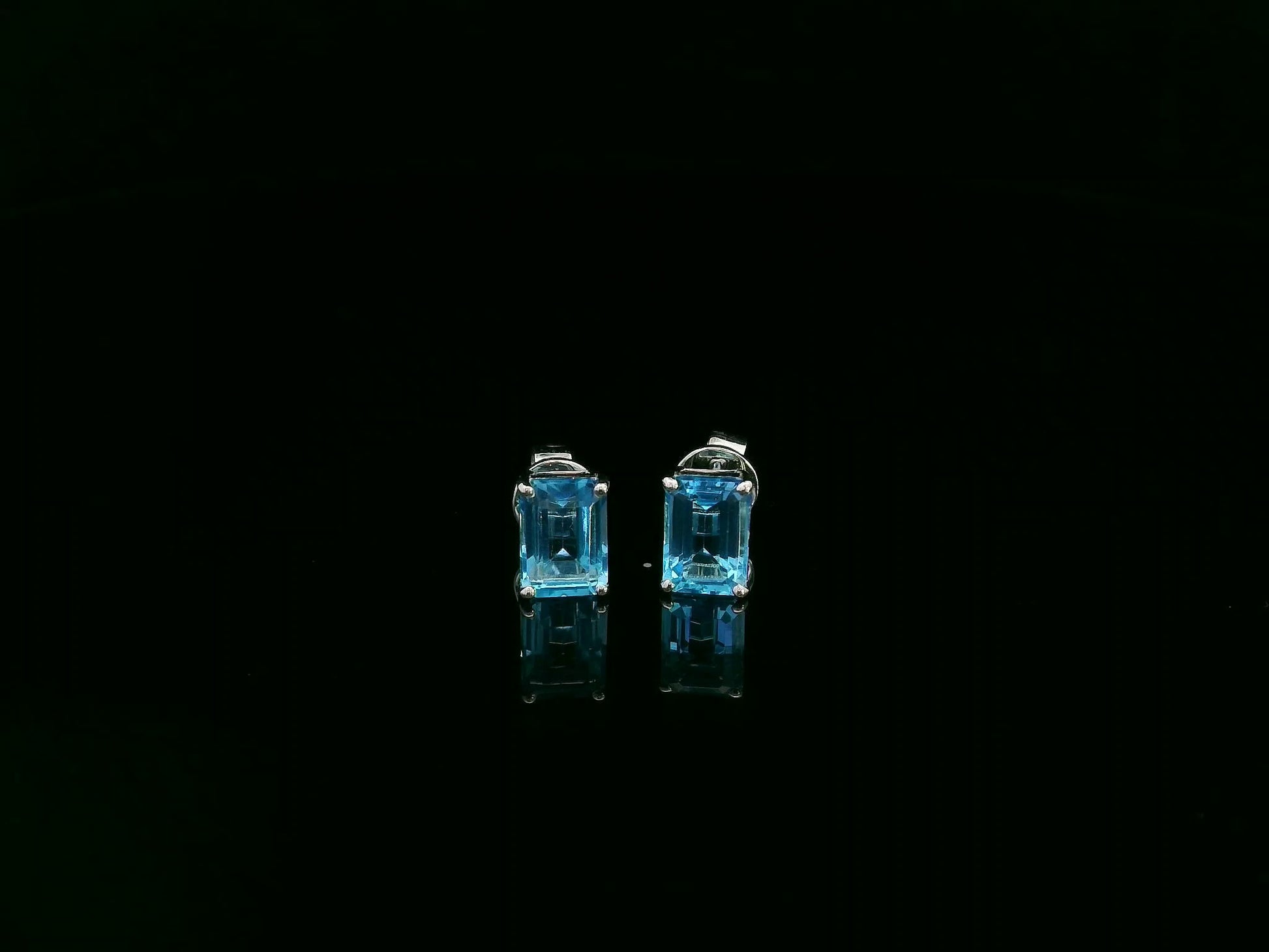 18K white gold emerald cut blue topaz stud earrings 2.44 carat by Emirates Diamonds