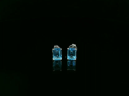 18K white gold emerald cut blue topaz stud earrings 2.44 carat by Emirates Diamonds