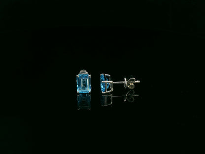 18K white gold emerald cut blue topaz stud earrings 2.44 carat by Emirates Diamonds