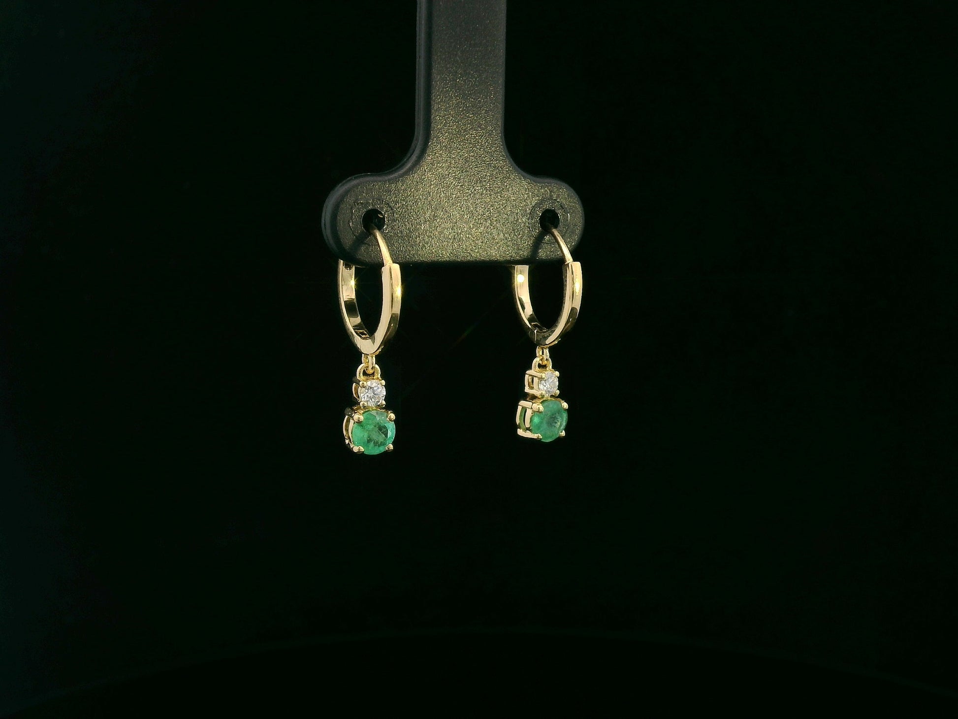 18K yellow gold emerald and diamond drop earrings by Emirates Diamonds