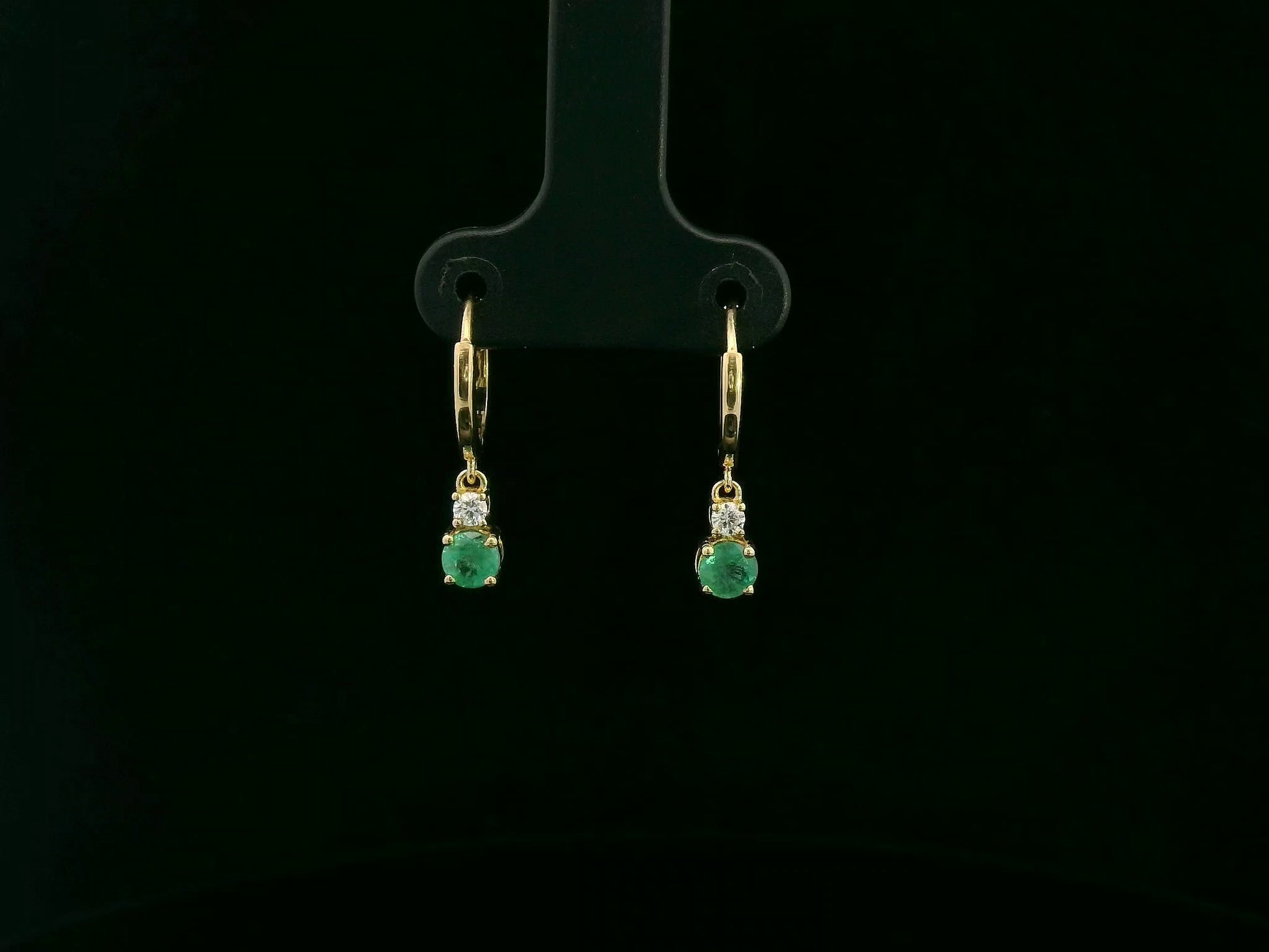 18K yellow gold emerald and diamond drop earrings by Emirates Diamonds
