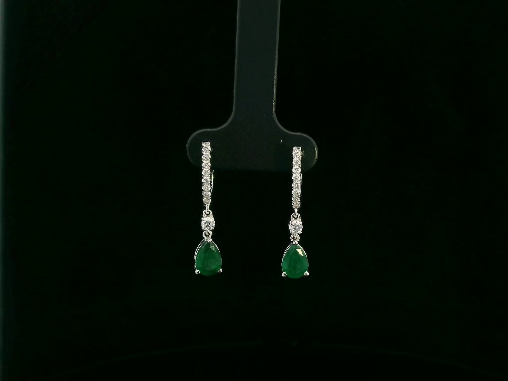 18K white gold emerald and diamond drop earrings with pear-shaped emeralds by Emirates Diamonds