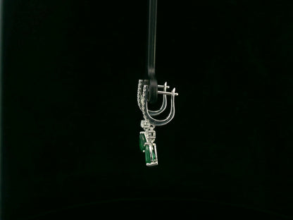 18K white gold emerald and diamond drop earrings with pear-shaped emeralds by Emirates Diamonds