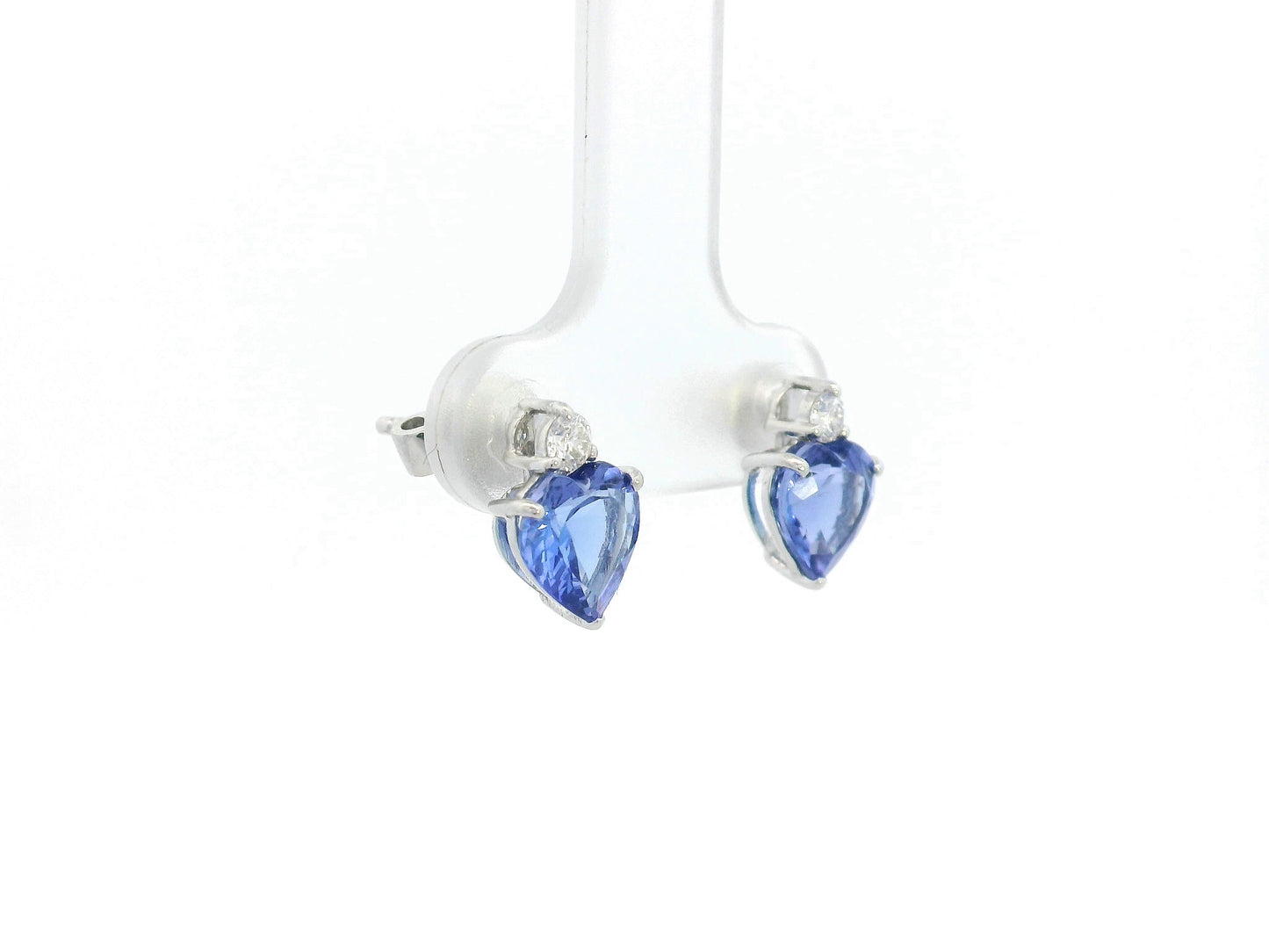 Heart-shaped tanzanite and diamond earrings in 18K white gold by Emirates Diamonds.