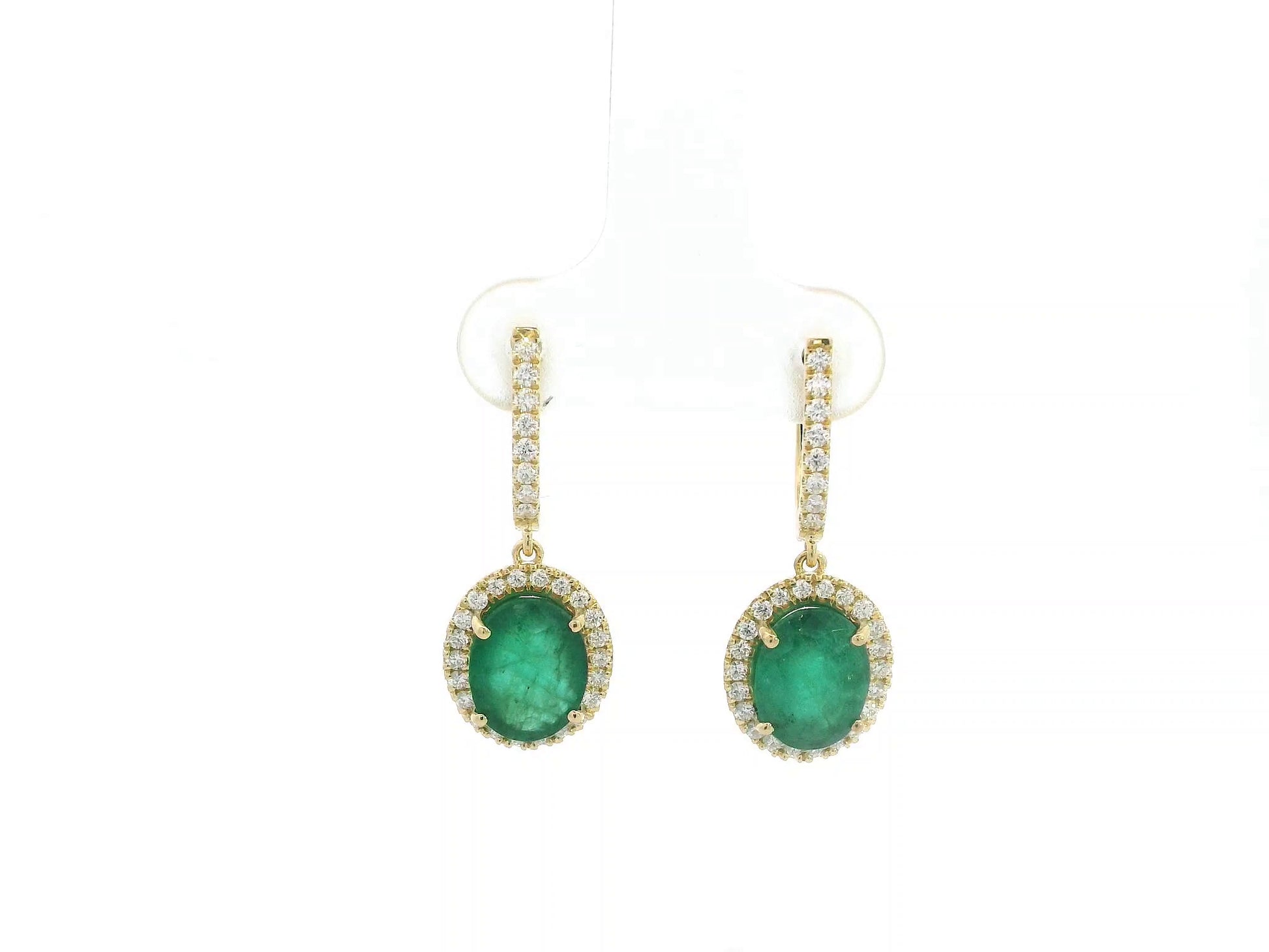 18K yellow gold emerald and diamond drop earrings with oval emeralds and diamond halo, luxury fine jewelry by Emirates Diamonds.