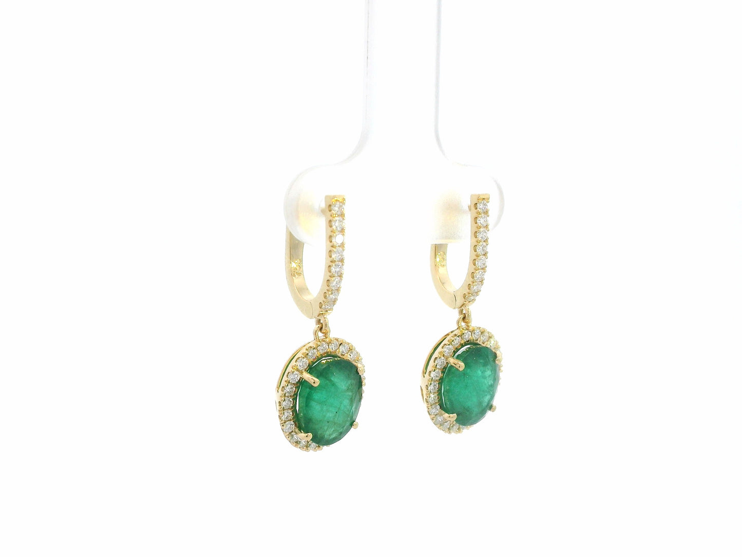 18K yellow gold emerald and diamond drop earrings with oval emeralds and diamond halo, luxury fine jewelry by Emirates Diamonds.