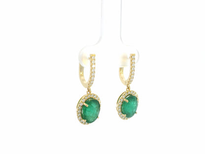 18K yellow gold emerald and diamond drop earrings with oval emeralds and diamond halo, luxury fine jewelry by Emirates Diamonds.
