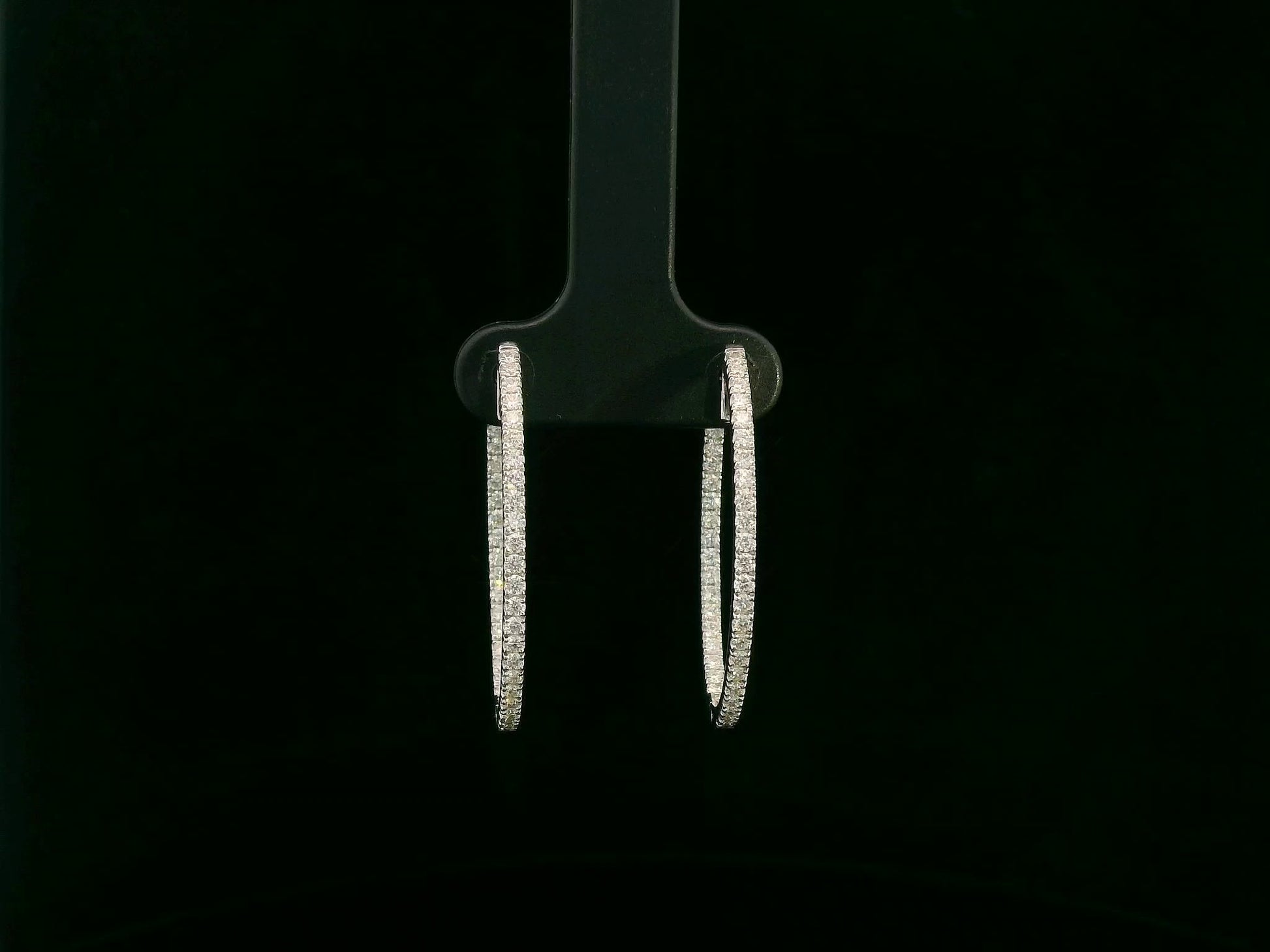 18K white gold diamond hoop earrings with pavé-set diamonds by Emirates Diamonds