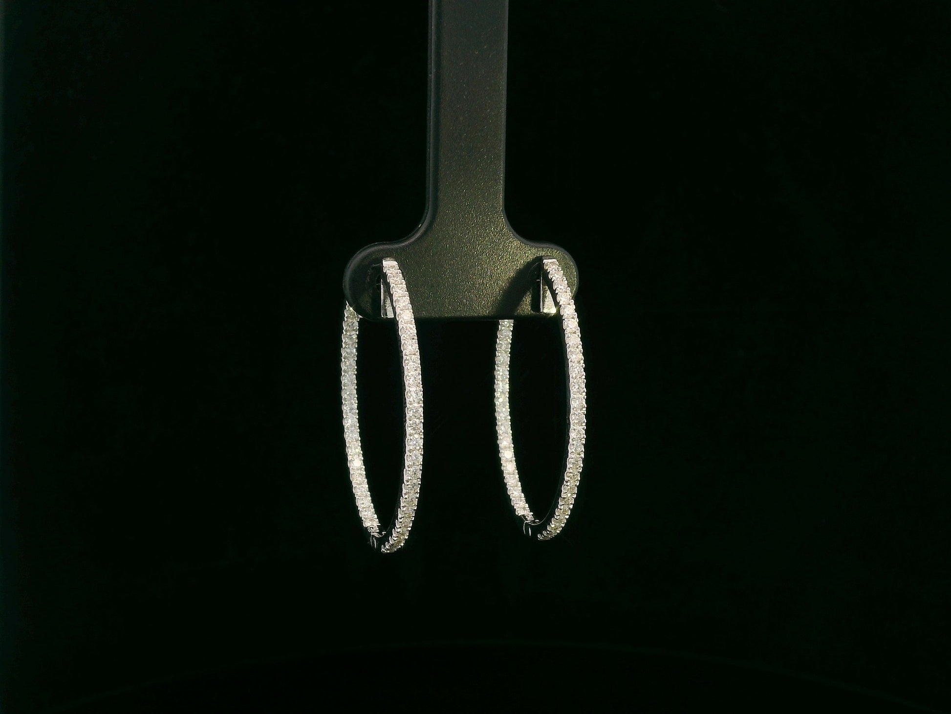 18K white gold diamond hoop earrings with pavé-set diamonds by Emirates Diamonds