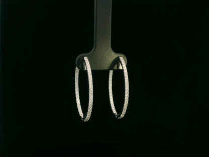18K white gold diamond hoop earrings with pavé-set diamonds by Emirates Diamonds