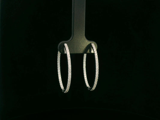 18K white gold diamond hoop earrings with pavé-set diamonds by Emirates Diamonds