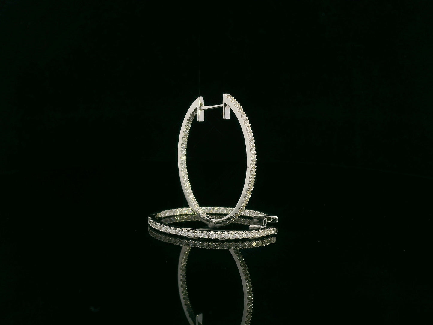 18K white gold diamond hoop earrings with pavé-set diamonds by Emirates Diamonds
