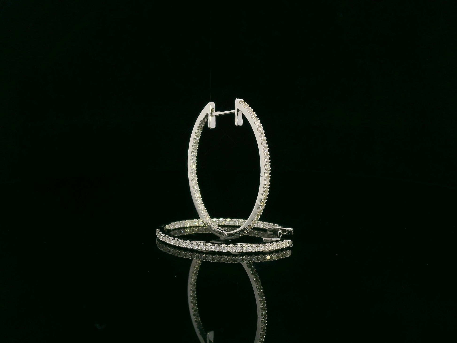 18K white gold diamond hoop earrings with pavé-set diamonds by Emirates Diamonds