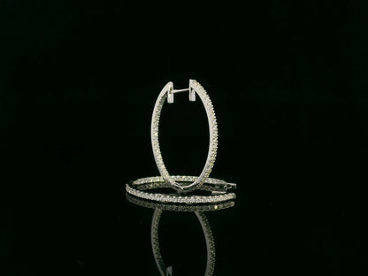 18K white gold diamond hoop earrings with pavé-set diamonds by Emirates Diamonds