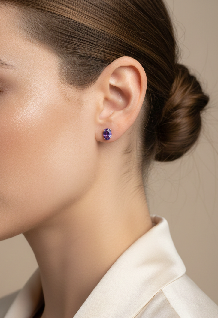 18K white gold tanzanite stud earrings with oval-cut natural tanzanites by Emirates Diamonds