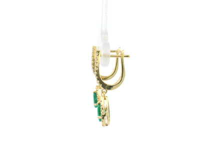 18K yellow gold emerald and diamond drop earrings with pear-shaped emeralds and diamond halo, luxury fine jewelry by Emirates Diamonds.