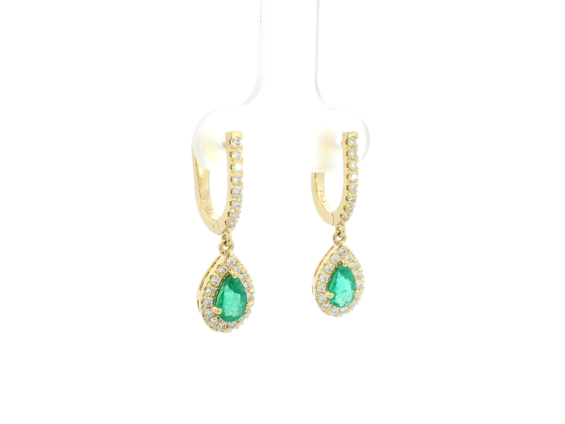 18K yellow gold emerald and diamond drop earrings with pear-shaped emeralds and diamond halo, luxury fine jewelry by Emirates Diamonds.