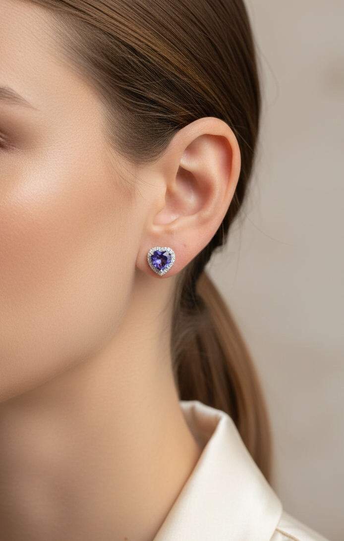 18K white gold tanzanite and diamond heart stud earrings by Emirates Diamonds