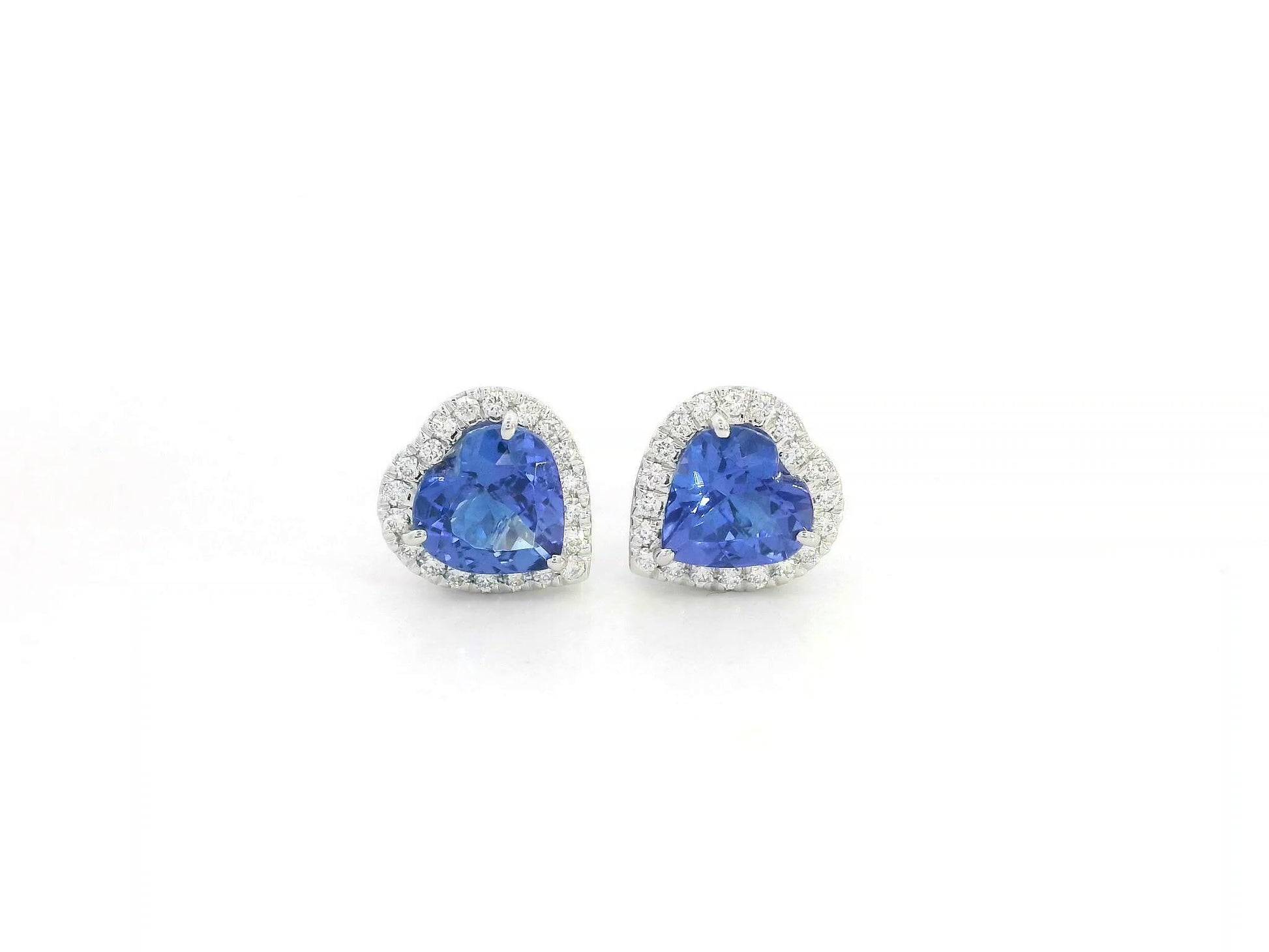18K white gold tanzanite and diamond heart stud earrings by Emirates Diamonds