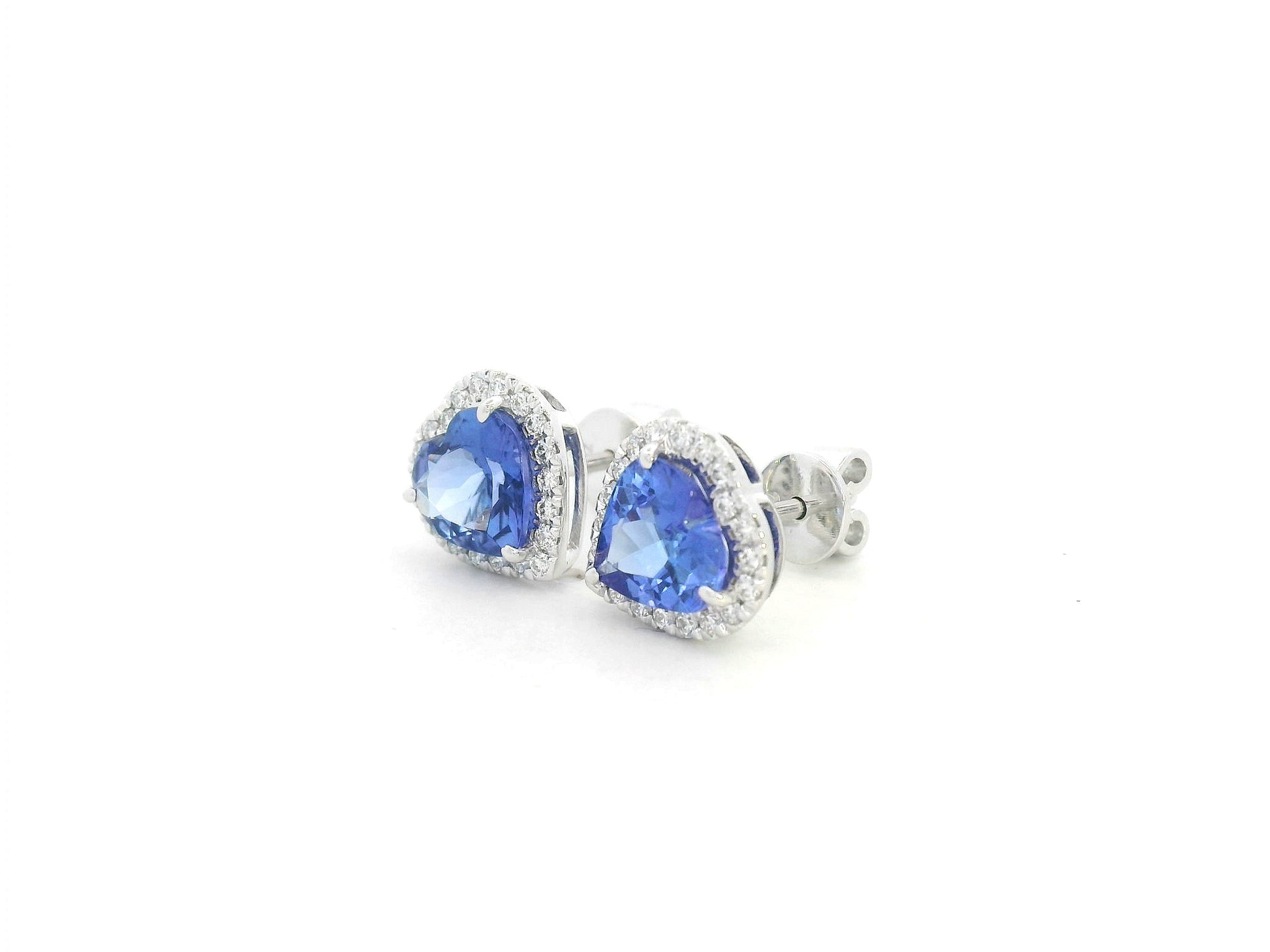 18K white gold tanzanite and diamond heart stud earrings by Emirates Diamonds