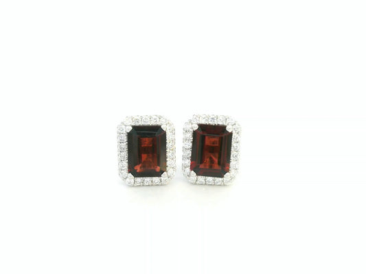 18K white gold stud earrings feature 3.34 carat emerald-cut garnets with 0.37 carat diamond accents by Emirates Diamonds.