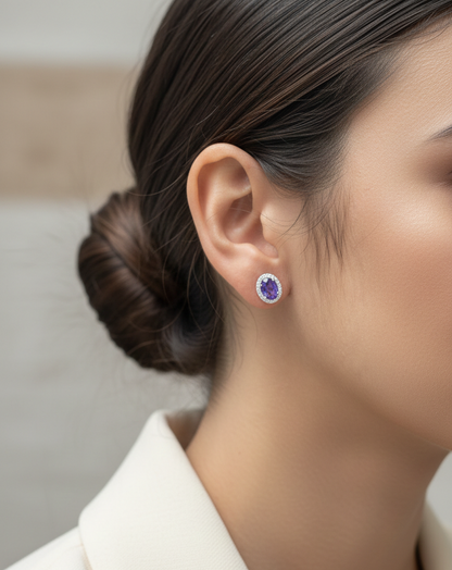 Tanzanite and diamond halo stud earrings in 18K white gold by Emirates Diamonds.