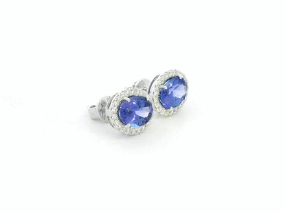 Tanzanite and diamond halo stud earrings in 18K white gold by Emirates Diamonds.