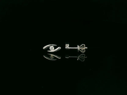 18K white gold modern diamond stud earrings with sculptural swirl design and round diamonds, total diamond weight 0.12 carat, Emirates Diamonds.