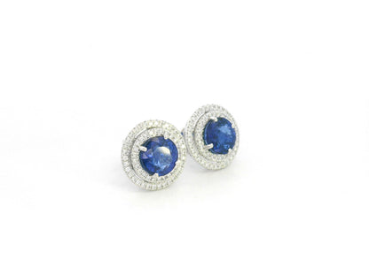18K white gold blue sapphire halo stud earrings with diamond accents by Emirates Diamonds