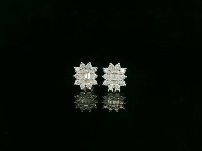 Round and baguette diamond cluster stud earrings in 18K white gold with 0.96 carat natural diamonds by Emirates Diamonds.