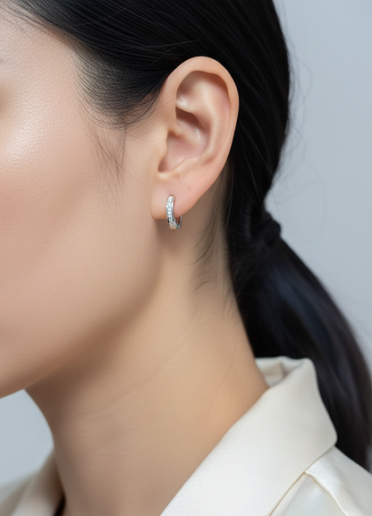 18K white gold channel-set diamond huggie earrings with round brilliant diamonds – Emirates Diamonds