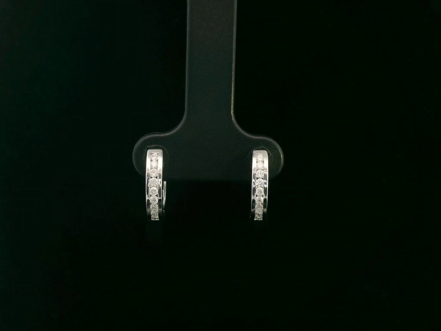 18K white gold channel-set diamond huggie earrings with round brilliant diamonds – Emirates Diamonds